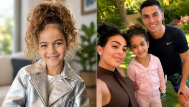 Alana Martina smiling with her parents Cristiano Ronaldo and Georgina Rodríguez during a family celebration.