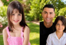 Eva Maria Dos Santos smiling with her family during a special celebration